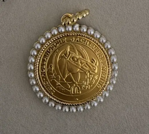 Horse pearl medallion