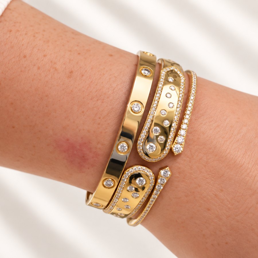 Stacked gold and diamond bracelets