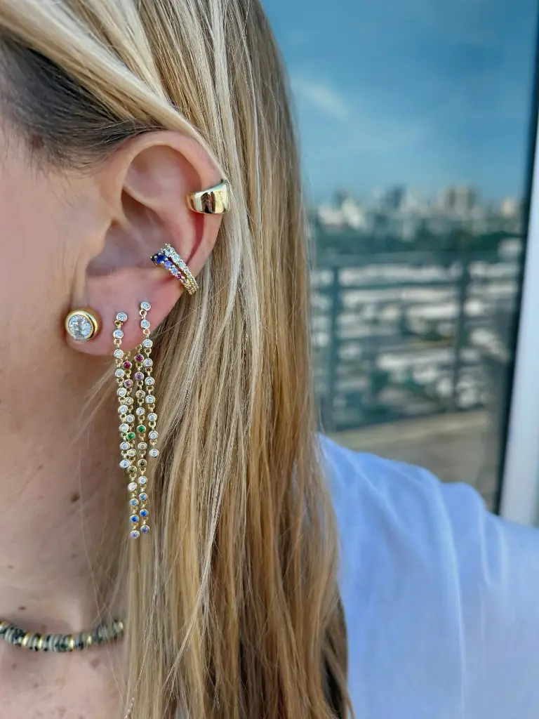 bezel falling earring on model.webp