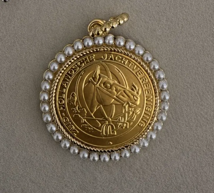 Horse pearl medallion